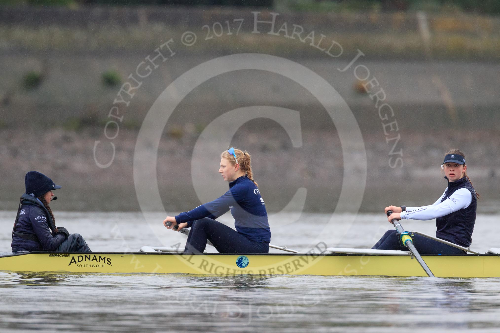 The Boat Race season 2018 - Women's Boat Race Trial Eights (OUWBC, Oxford): Before the race in the rain:  "Coursing River" with cox Ellie Shearer, stroke Beth Bridgman, 7 Juliette Perry.
River Thames between Putney Bridge and Mortlake,
London SW15,

United Kingdom,
on 21 January 2018 at 14:20, image #28