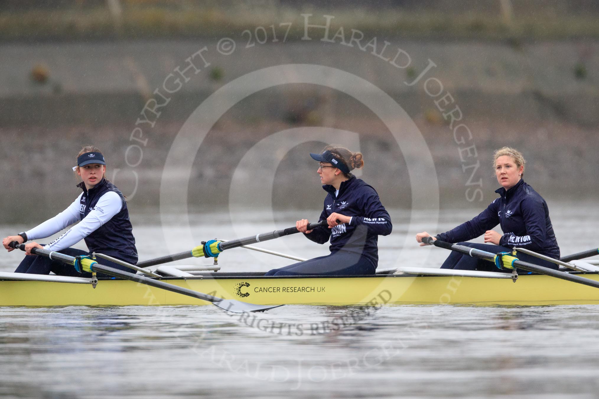 The Boat Race season 2018 - Women's Boat Race Trial Eights (OUWBC, Oxford): Before the race in the rain:  "Coursing River" with 7 Juliette Perry, 6 Katherine Erickson, 5 Morgan McGovern.
River Thames between Putney Bridge and Mortlake,
London SW15,

United Kingdom,
on 21 January 2018 at 14:20, image #29