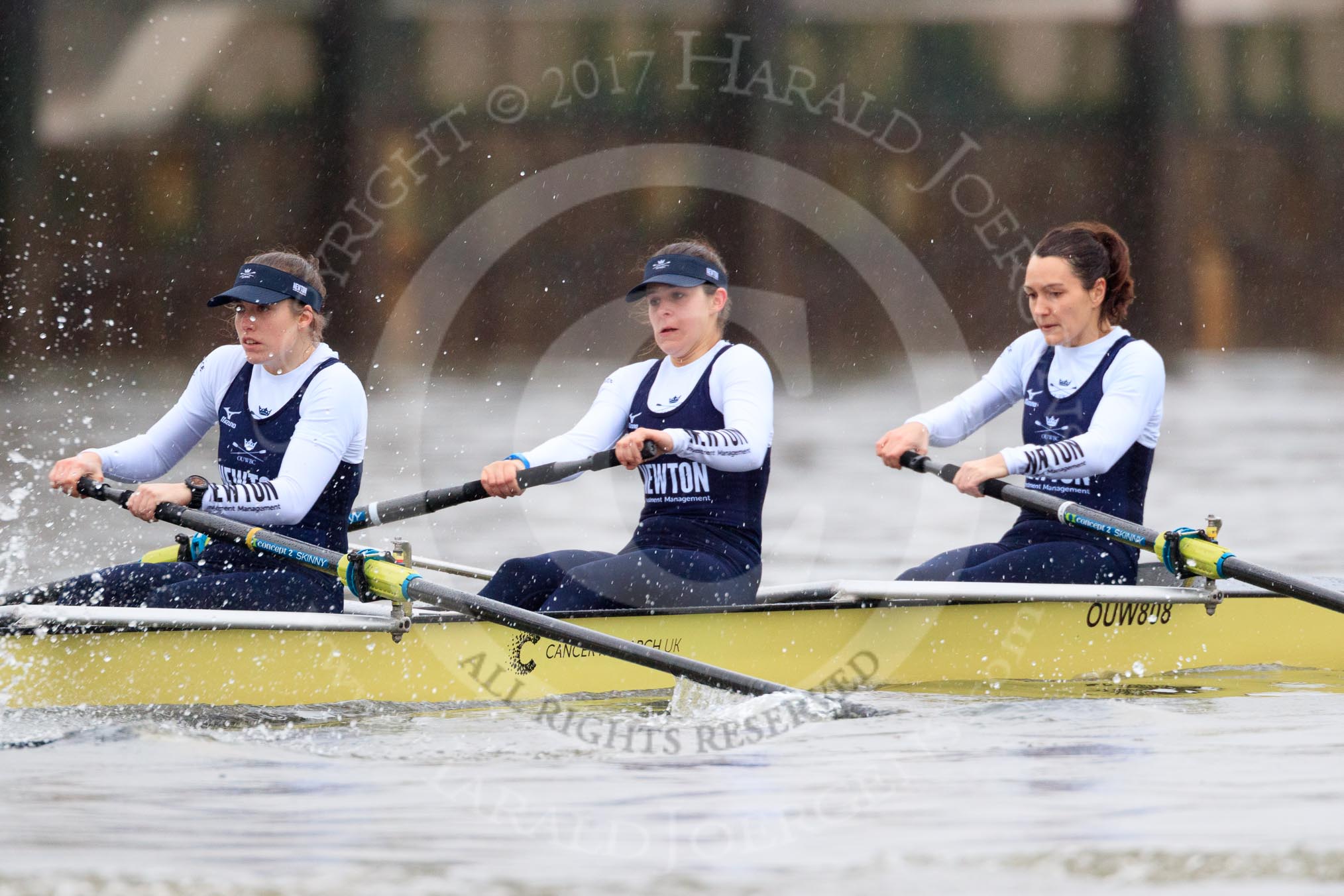 The Boat Race season 2018 - Women's Boat Race Trial Eights (OUWBC, Oxford): "Coursing River" seconds after the race has been started - 3 Stefanie Zekoll, 2 Rachel Anderson, bow Sarah Payne-Riches.
River Thames between Putney Bridge and Mortlake,
London SW15,

United Kingdom,
on 21 January 2018 at 14:27, image #53