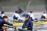 The Boat Race season 2018 - Women's Boat Race Trial Eights (OUWBC, Oxford): Adjustments before the race - stroke Alice Roberts, cox Jessica Buck on "Great Typhoon", with "Coursing River" (and the rain) in the background.
River Thames between Putney Bridge and Mortlake,
London SW15,

United Kingdom,
on 21 January 2018 at 14:23, image #36