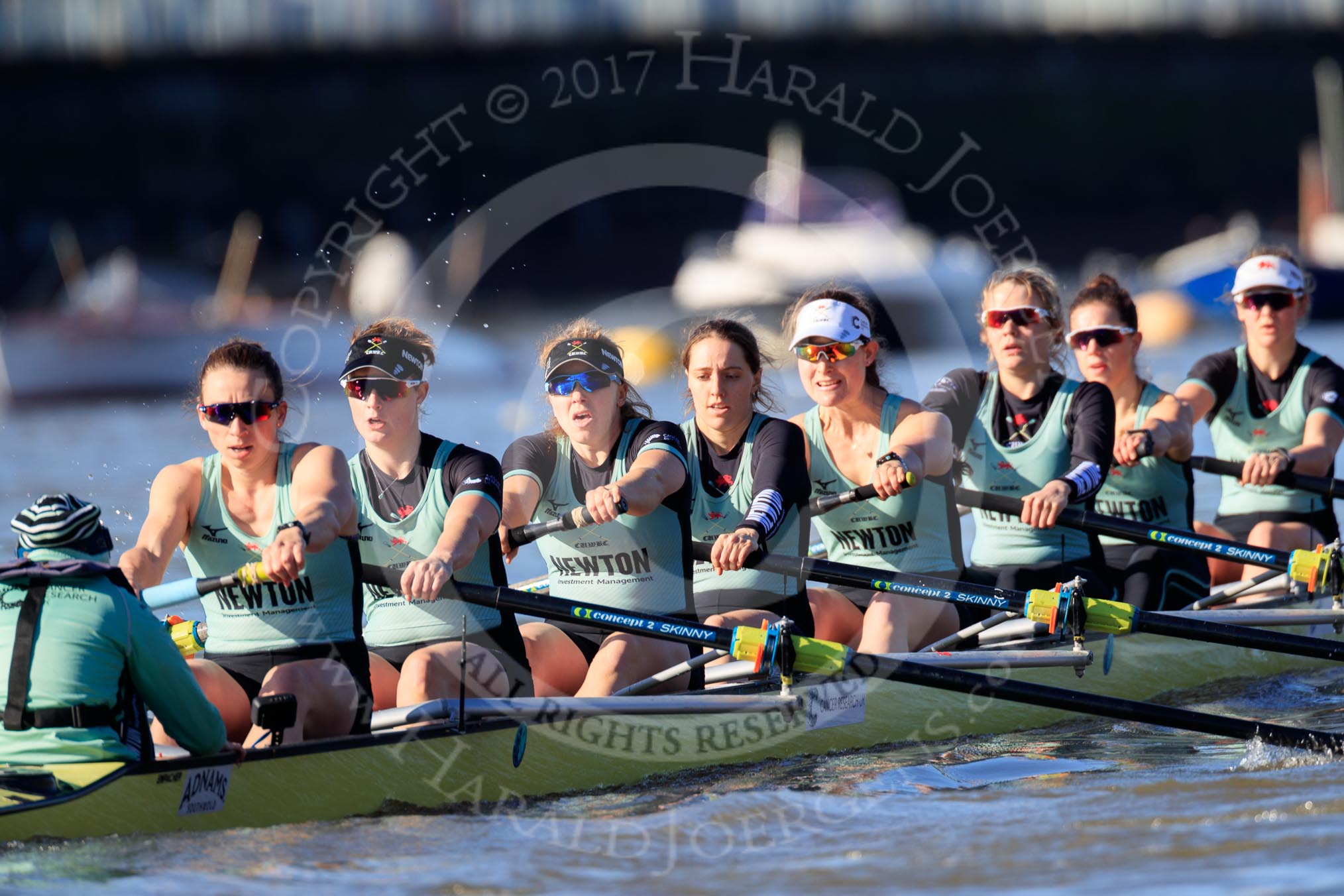 The Women's Boat Race season 2018 - fixture CUWBC vs. ULBC: CUWBC extending their lead near the Putney boat houses - cox Sophie Shapter, stroke Tricia Smith, 7 Imogen Grant, 6 Anne Beenken, 5 Thea Zabell, 4 Paula Wesselmann, 3 Alice White, 2 Myriam Goudet-Boukhatmi, bow Olivia Coffey.
River Thames between Putney Bridge and Mortlake,
London SW15,

United Kingdom,
on 17 February 2018 at 13:10, image #53