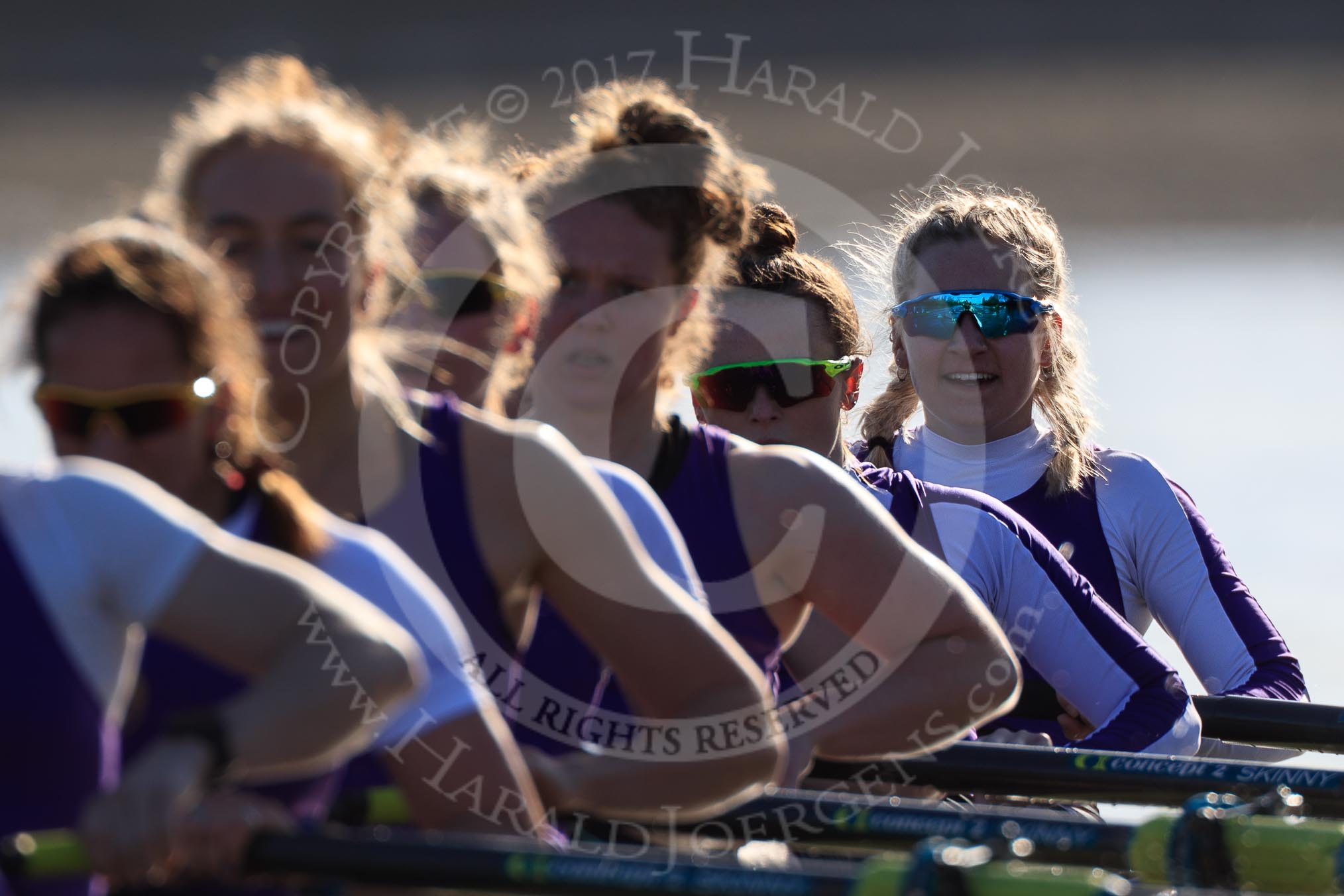 The Women's Boat Race season 2018 - fixture CUWBC vs. ULBC: A backlit shot of the ULBC Eight - 6 Oonagh Cousins, 5 Hannah Roberts, 4 Katherine Barnhill, 3 Fionnuala Gannon, 2 Robyn Hart-Winks, bow Ally French.
River Thames between Putney Bridge and Mortlake,
London SW15,

United Kingdom,
on 17 February 2018 at 13:29, image #127