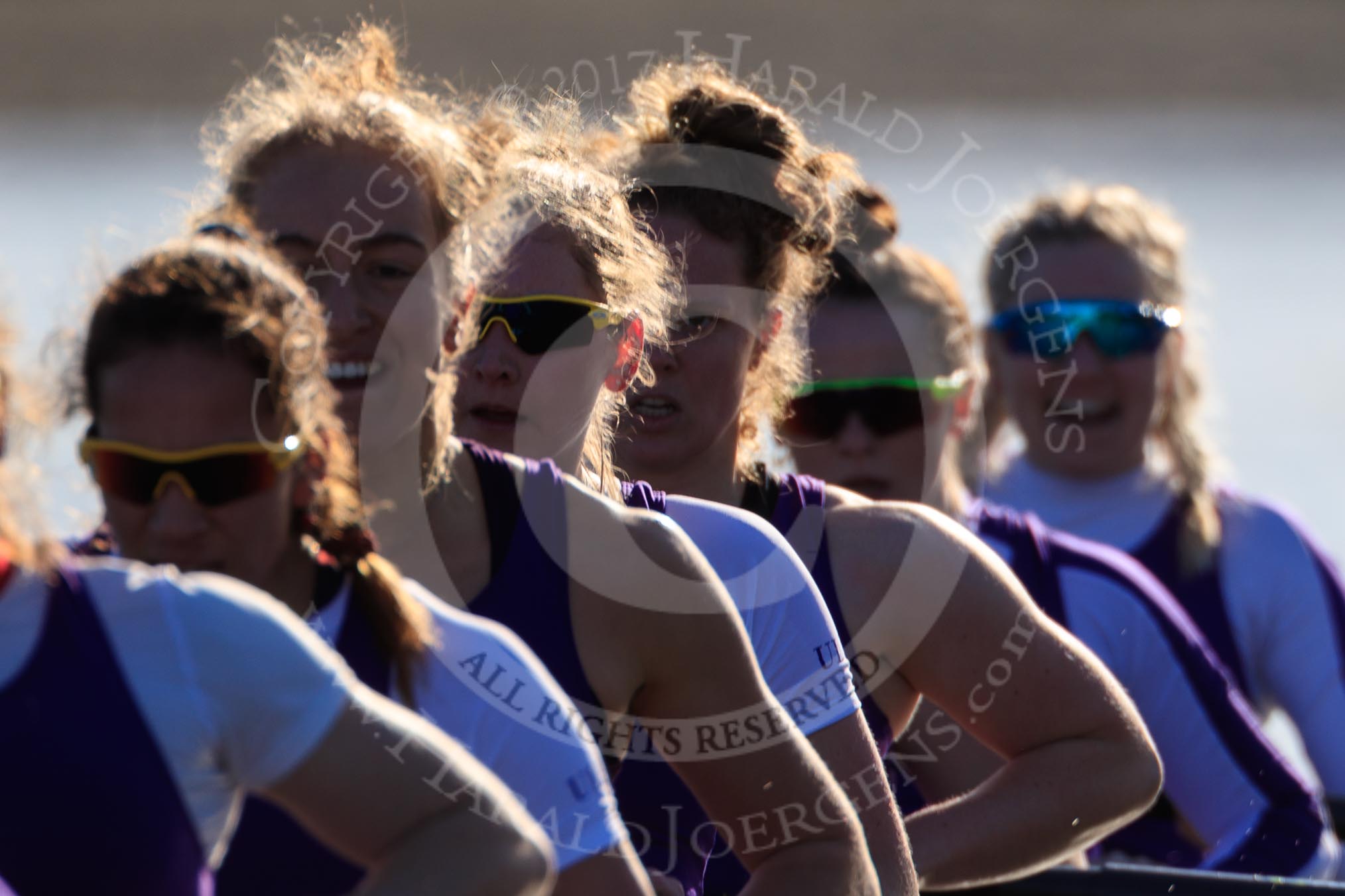 The Women's Boat Race season 2018 - fixture CUWBC vs. ULBC: A backlit shot of the ULBC Eight - 6 Oonagh Cousins, 5 Hannah Roberts, 4 Katherine Barnhill, 3 Fionnuala Gannon, 2 Robyn Hart-Winks, bow Ally French.
River Thames between Putney Bridge and Mortlake,
London SW15,

United Kingdom,
on 17 February 2018 at 13:30, image #128