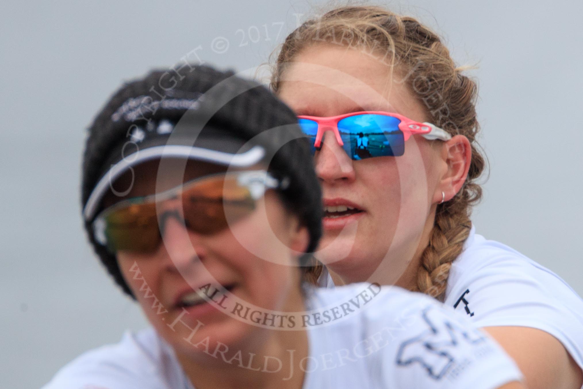 The Women's Boat Race season 2018 - fixture OUWBC vs. Molesey BC: Molesey's 3 seat Gabby Rodriguez and  2 Lucy Primmer, with the boat mirrored in her sunglasses.
River Thames between Putney Bridge and Mortlake,
London SW15,

United Kingdom,
on 04 March 2018 at 13:49, image #73