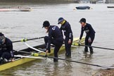 The Women's Boat Race season 2018 - fixture OUWBC vs. Molesey BC: OUWBC getting the boat ready on a cold and rainy day, here 4 seat Alice Roberts, 3 Juliette Perry, 2 Katherine Erickson, bow Renée Koolschijn.
River Thames between Putney Bridge and Mortlake,
London SW15,

United Kingdom,
on 04 March 2018 at 13:04, image #1