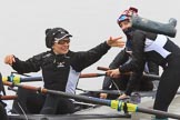 The Women's Boat Race season 2018 - fixture OUWBC vs. Molesey BC: Molesey's 3 seat Gabby Rodriguez throwing one of  her wellies, 2 seat Lucy Primmer, and bow Emma Boyns.
River Thames between Putney Bridge and Mortlake,
London SW15,

United Kingdom,
on 04 March 2018 at 13:09, image #18