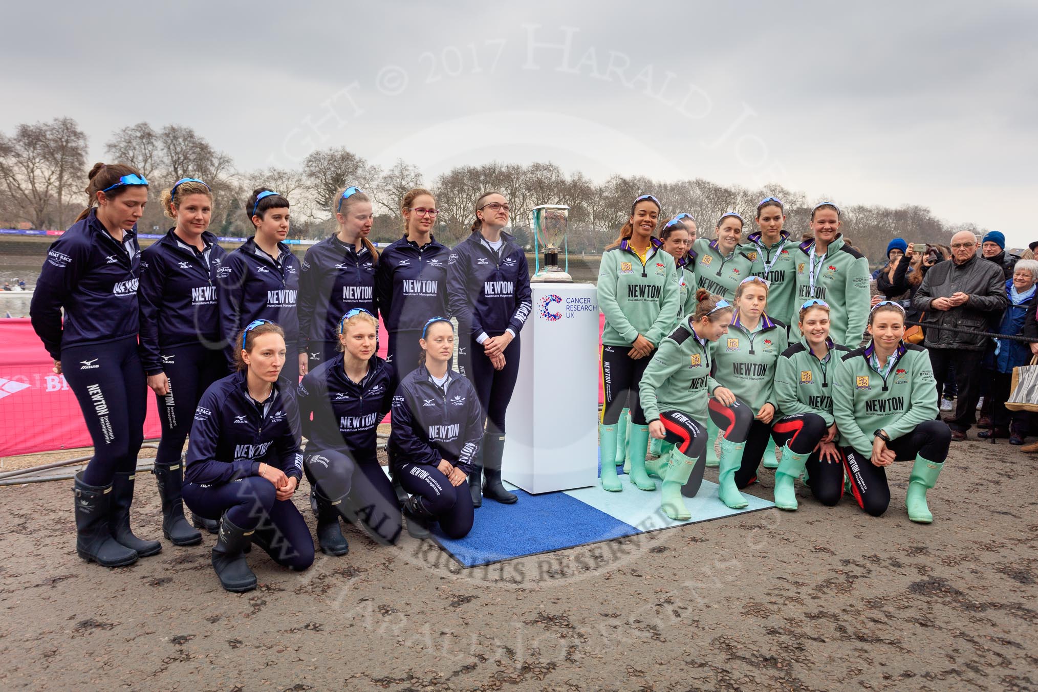 The Cancer Research UK Women's Boat Race 2018: The Oxford- and Cambridge crews, with the Women's Boat Race trophy, after the toss.
River Thames between Putney Bridge and Mortlake,
London SW15,

United Kingdom,
on 24 March 2018 at 14:42, image #52