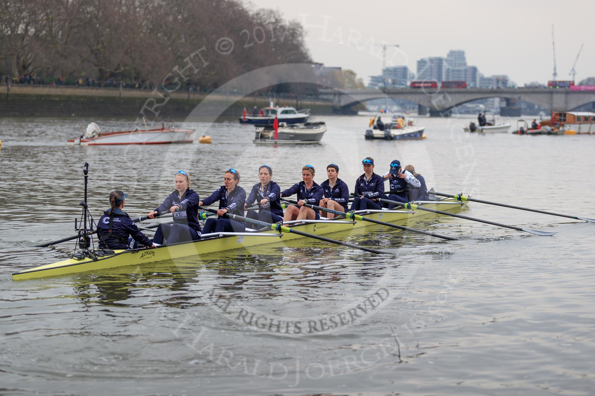 The Cancer Research UK Women's Boat Race 2018: The Oxford Blue Boat crew leaving the boathouse area - cox Jessica Buck, stroke Beth Bridgman, 7 Abigail Killen, 6 Sara Kushma, 5 Morgan McGovern, 4 Alice Roberts, 3 Juliette Perry, 2 Katherine Erickson, bow Renée Koolschijn.
River Thames between Putney Bridge and Mortlake,
London SW15,

United Kingdom,
on 24 March 2018 at 15:45, image #111