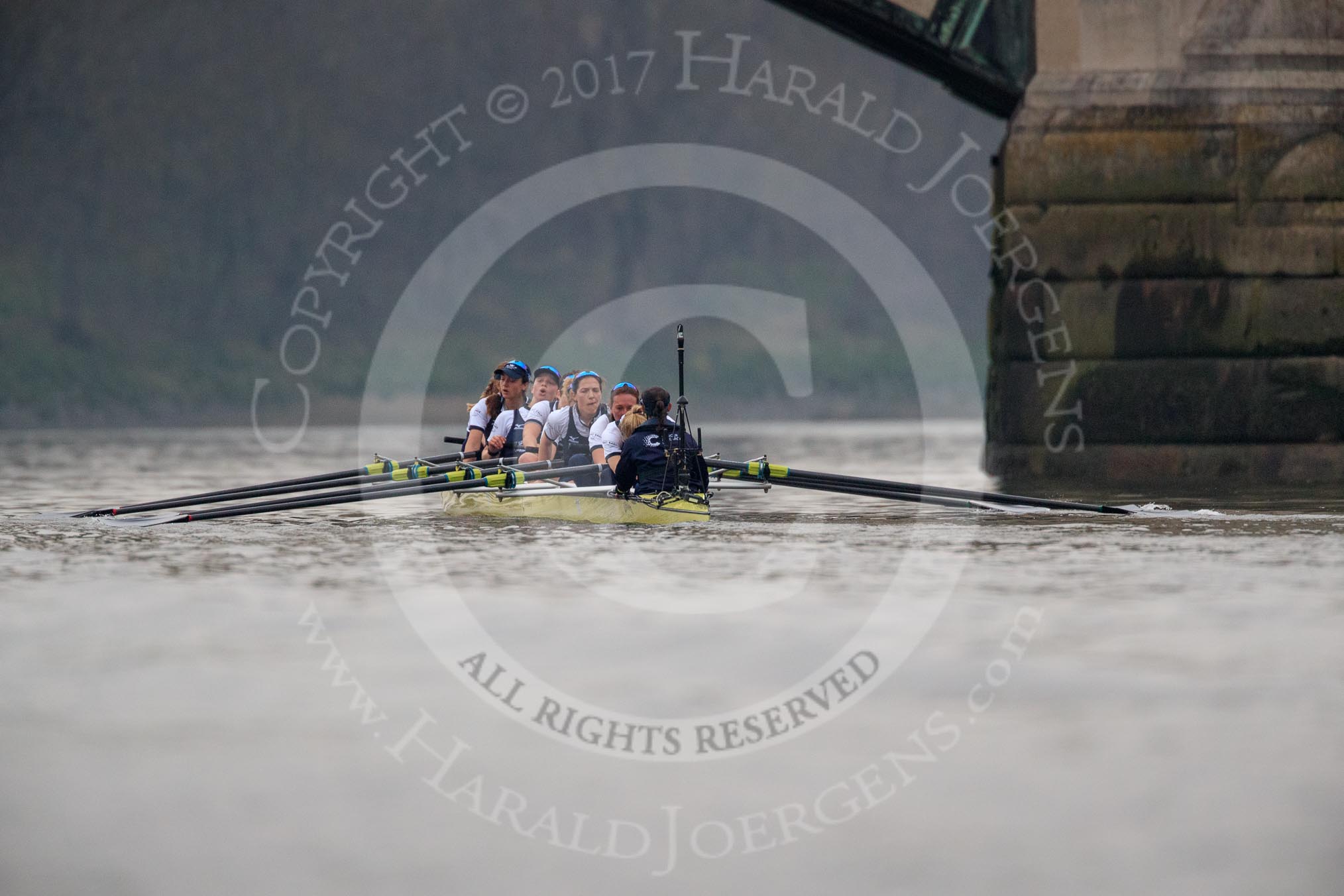 The Cancer Research UK Women's Boat Race 2018: The Oxford women passing the second line as second - bow Renée Koolschijn, 2 Katherine Erickson, 3 Juliette Perry, 4 Alice Roberts, 5 Morgan McGovern, 6 Sara Kushma, 7 Abigail Killen, stroke Beth Bridgman, cox Jessica Buck.
River Thames between Putney Bridge and Mortlake,
London SW15,

United Kingdom,
on 24 March 2018 at 16:50, image #219