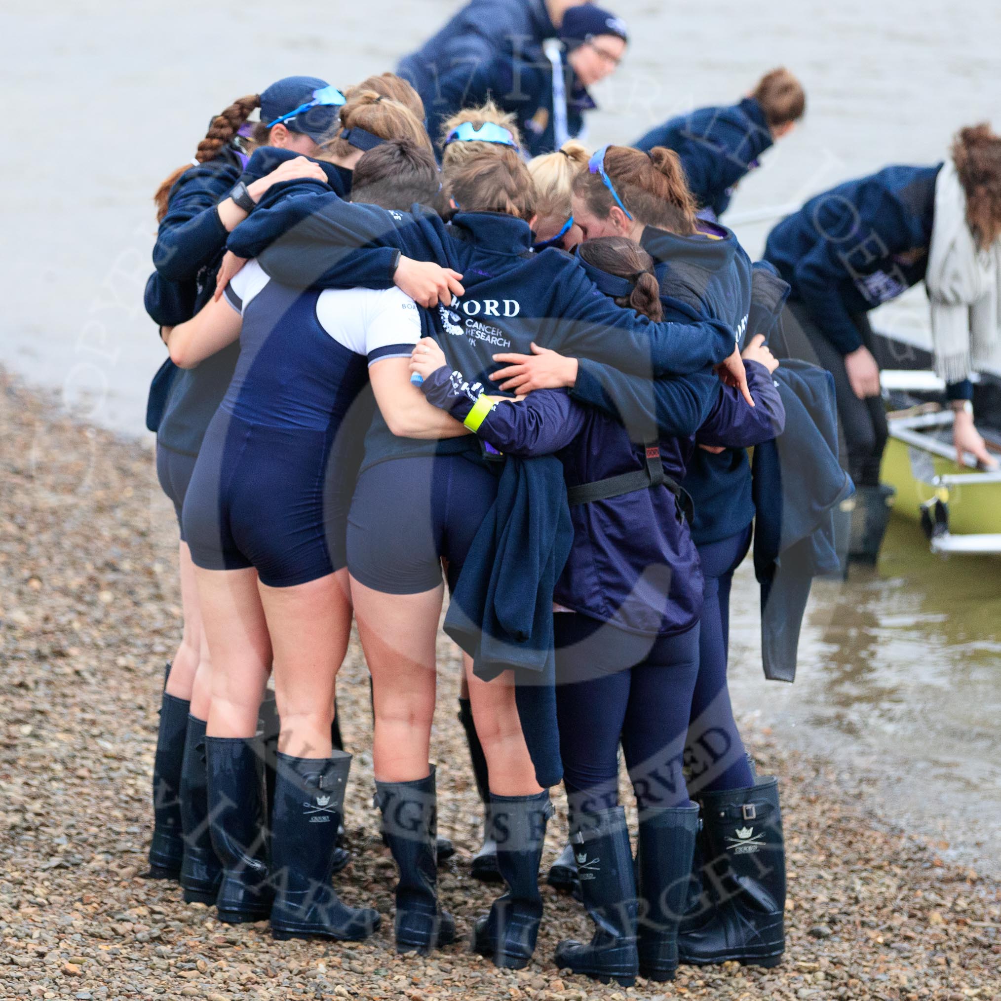 The Cancer Research UK Women's Boat Race 2018: The Oxford women, arriving second, huddled together after the race.
River Thames between Putney Bridge and Mortlake,
London SW15,

United Kingdom,
on 24 March 2018 at 16:58, image #228
