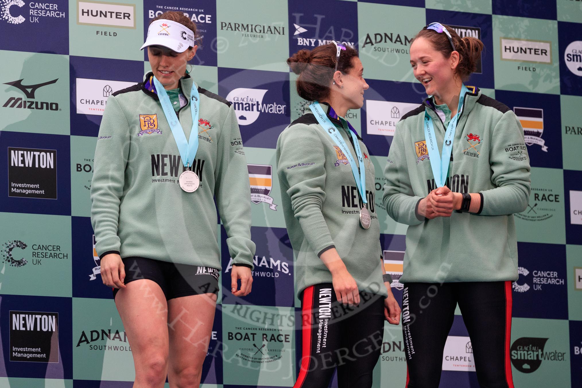 The Cancer Research UK Women's Boat Race 2018: Cambridge 3 seat Kelsey Barolak , 2 Imogen Grant, and bow Tricia Smith on the podium.
River Thames between Putney Bridge and Mortlake,
London SW15,

United Kingdom,
on 24 March 2018 at 17:06, image #258
