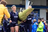 The Cancer Research UK Women's Boat Race 2018: THe Oxford boat, with the BBC camera assembly mounted on the rear, is carried out of the boathouse. In front 5 seat Morgan McGovern.
River Thames between Putney Bridge and Mortlake,
London SW15,

United Kingdom,
on 24 March 2018 at 15:42, image #89