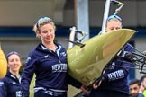 The Cancer Research UK Women's Boat Race 2018: THe Oxford boat, with the BBC camera assembly mounted on the rear, is carried out of the boathouse. In front 5 seat Morgan McGovern.
River Thames between Putney Bridge and Mortlake,
London SW15,

United Kingdom,
on 24 March 2018 at 15:42, image #90