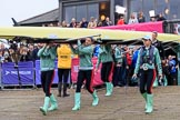 The Cancer Research UK Women's Boat Race 2018: The Cambridge Blue Boat crew carrying their boat from the boathouses to the river.
River Thames between Putney Bridge and Mortlake,
London SW15,

United Kingdom,
on 24 March 2018 at 15:45, image #112