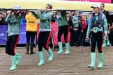 The Cancer Research UK Women's Boat Race 2018: The Cambridge Blue Boat crew carrying their boat from the boathouses to the river.
River Thames between Putney Bridge and Mortlake,
London SW15,

United Kingdom,
on 24 March 2018 at 15:46, image #113