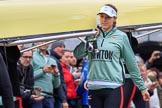 The Cancer Research UK Women's Boat Race 2018: The Cambridge Blue Boat crew carrying their boat from the boathouses to the river, here 3 seat Kelsey Barolak.
River Thames between Putney Bridge and Mortlake,
London SW15,

United Kingdom,
on 24 March 2018 at 15:46, image #114