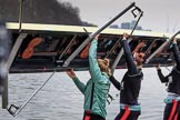 The Cancer Research UK Women's Boat Race 2018: The Cambridge Blue Boat crew carrying their boat from the boathouses to the river.
River Thames between Putney Bridge and Mortlake,
London SW15,

United Kingdom,
on 24 March 2018 at 15:46, image #115