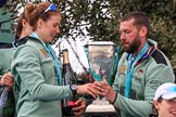 The Cancer Research UK Women's Boat Race 2018: Cambridge 6 seat Alice White with the Women's Boat Race trophy, a bottle of Chapel Down Brut, and Cambridge Head Coach Rob Baker.
River Thames between Putney Bridge and Mortlake,
London SW15,

United Kingdom,
on 24 March 2018 at 17:10, image #305