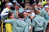 The Cancer Research UK Women's Boat Race 2018: CUWBC Head Coach Rob Baker, with the Women's Boat Race trophy, hugging Maria  O'Connor, Head of Sports Marketing, Professional Sports Group.
River Thames between Putney Bridge and Mortlake,
London SW15,

United Kingdom,
on 24 March 2018 at 17:12, image #311