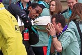 The Cancer Research UK Women's Boat Race 2018: The Women's Boat Race trophy is carried away, with CUWBC club coordinator James Lee volunteering to drink the remaining Chapel Down Brut from it.
River Thames between Putney Bridge and Mortlake,
London SW15,

United Kingdom,
on 24 March 2018 at 17:15, image #319