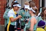 The Cancer Research UK Women's Boat Race 2018: Cambridge president Daphne Martschenko after the official ceremony, celebrating with a bottle of Chapel Down Brut.
River Thames between Putney Bridge and Mortlake,
London SW15,

United Kingdom,
on 24 March 2018 at 17:17, image #328