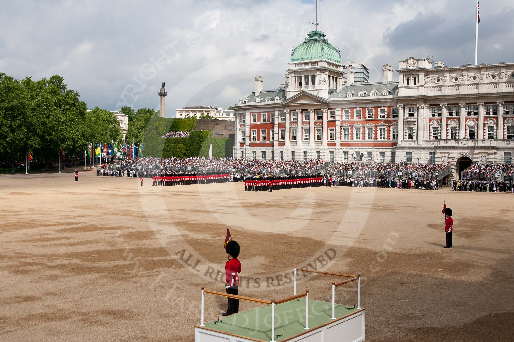 Trooping the Colour 2009: Horse Guards Parade an hour before the event. In front of the Old Admirality Building, No. 6 and No. 7 Guard are in position. The saluting base in the foreground will later be assembled and moved into position..
Horse Guards Parade, Westminster,
London SW1,

United Kingdom,
on 13 June 2009 at 10:27, image #51