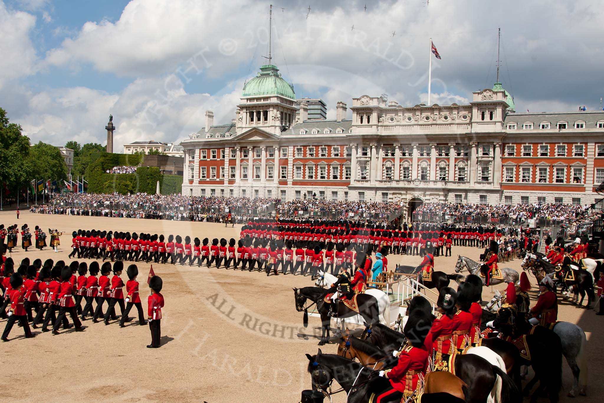 Trooping the Colour 2009: The March Past - foot guards divisions marching past Her Majesty, standing with the Duke of Edinburg on the saluting base. To their left and right the Royal Colonels..
Horse Guards Parade, Westminster,
London SW1,

United Kingdom,
on 13 June 2009 at 11:49, image #222