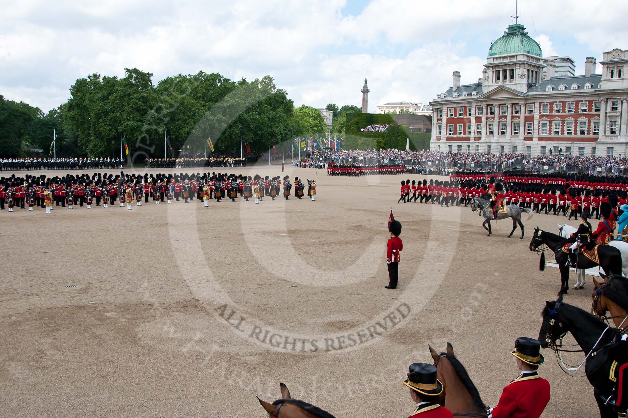 Trooping the Colour 2009: The March Past is about to end - the foot guards divisions are marching on the right hand side, on the left, in the centre of Horse Guards Parade, the Massed Bands, behind them on the left the Life Guards and Blues and Royals, on the right the Mounted Bands..
Horse Guards Parade, Westminster,
London SW1,

United Kingdom,
on 13 June 2009 at 11:50, image #224