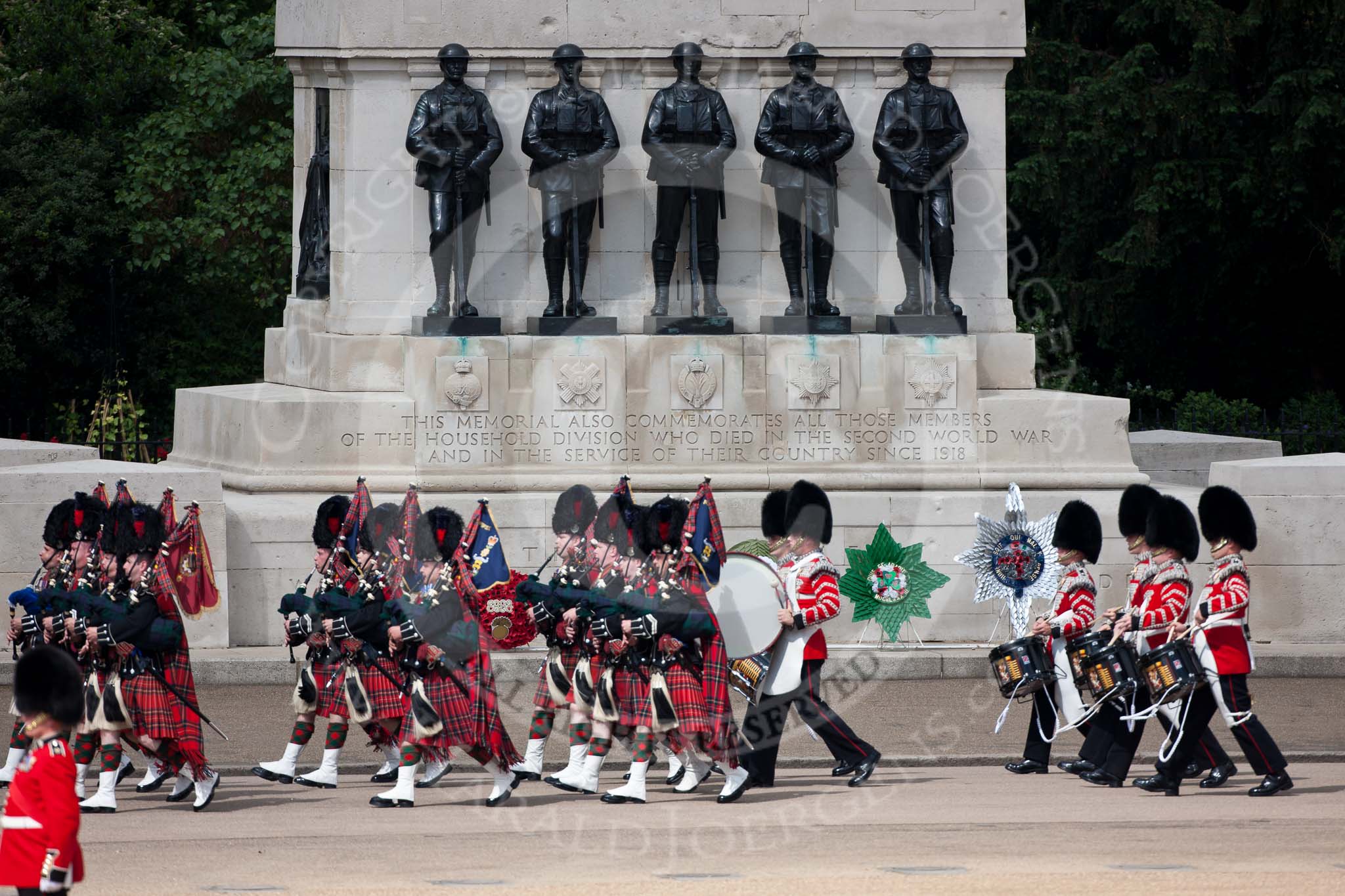 Trooping the Colour 2009: The Band of the Scots Guards, with their pipers in Royal Stewart Tartan, followed by their drummers, marching along the Guards Memorial..
Horse Guards Parade, Westminster,
London SW1,

United Kingdom,
on 13 June 2009 at 10:24, image #43