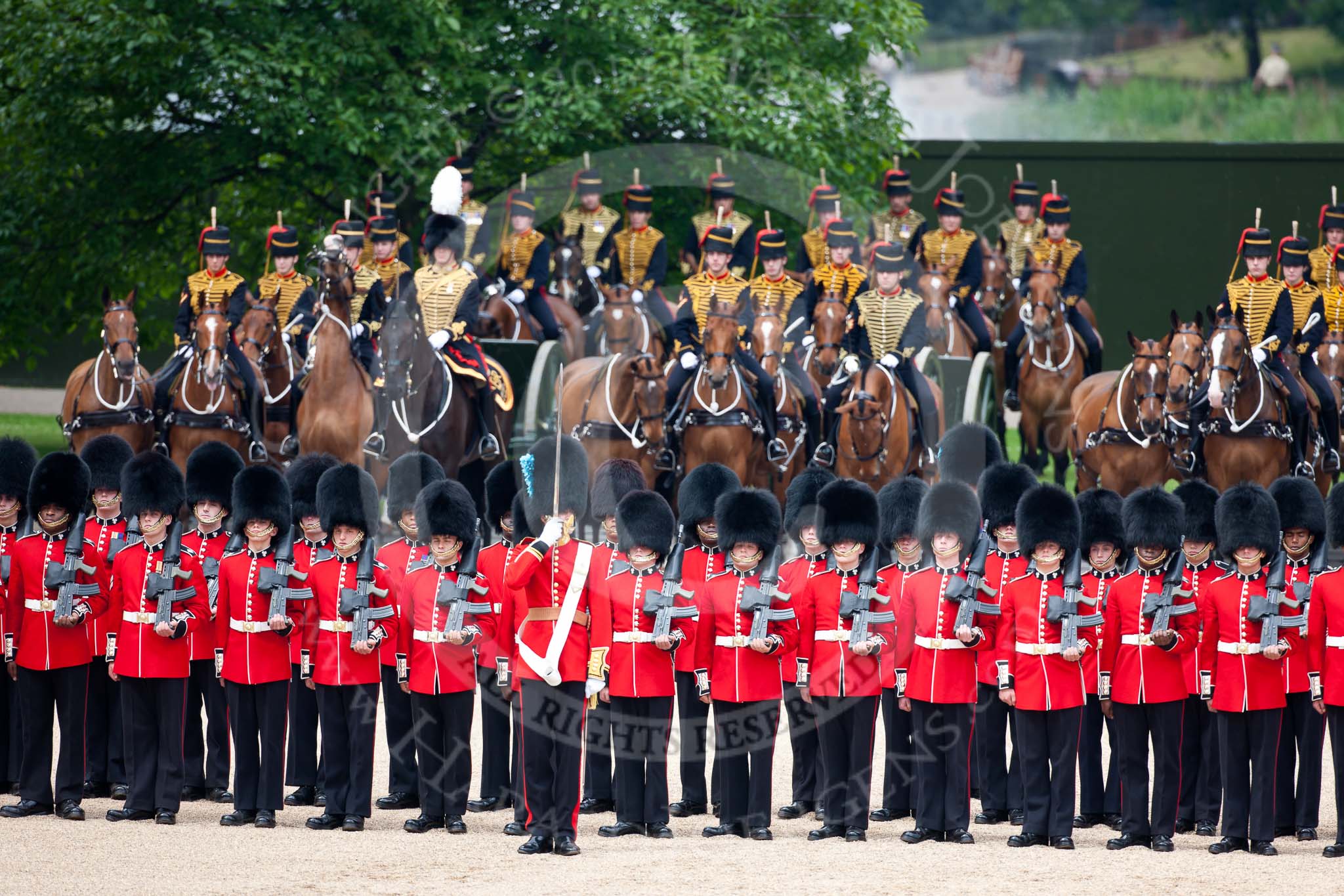 Trooping the Colour 2009: The King's Troop, Royal Horse Artillery, behind No. 1 Guard, the Escort for the Colour. In the centre the Ensign, 2nd Lieutenant Andrew Campbell, with the white colour belt..
Horse Guards Parade, Westminster,
London SW1,

United Kingdom,
on 13 June 2009 at 10:41, image #77