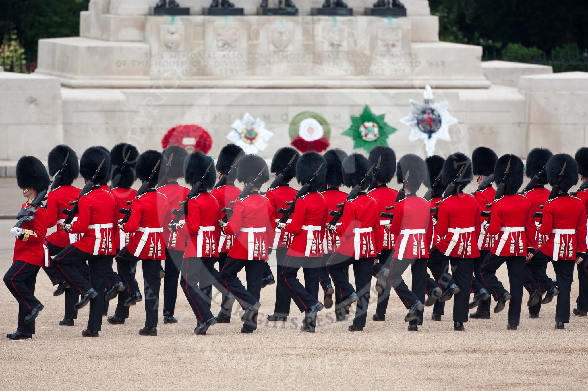Trooping the Colour 2009: No. 3 Guard, 1st Battalion Irish Guards, changing direction for the arrival of the Royal Procession. Behind them the Guards Memorial..
Horse Guards Parade, Westminster,
London SW1,

United Kingdom,
on 13 June 2009 at 10:42, image #81
