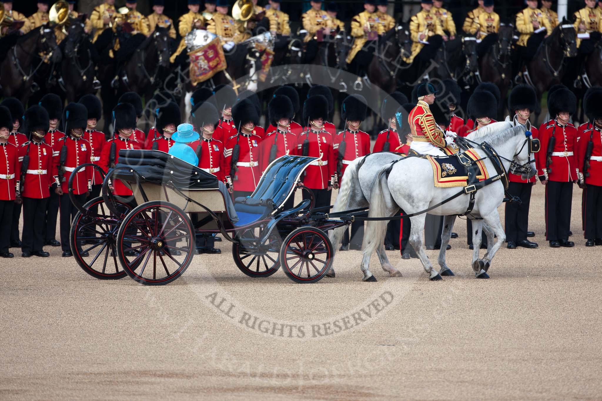 Trooping the Colour 2009: The Inspection of the Line, HM The Queen is driven along the line of guardsmen in the ivory mounted phaeton..
Horse Guards Parade, Westminster,
London SW1,

United Kingdom,
on 13 June 2009 at 11:02, image #144