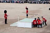 Trooping the Colour 2009: The saluting base has been moved into position and is assembled by guardsmen, under the watchful eye of GSM 'Billy' Mott, Welsh Guards, on the left..
Horse Guards Parade, Westminster,
London SW1,

United Kingdom,
on 13 June 2009 at 10:54, image #105