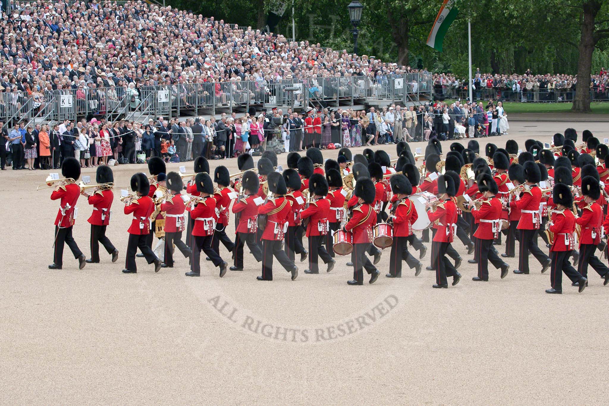 Trooping the Colour 2010: The Band of the Grenadier Guards (front) amd of the Welsh Guards (middle) are marching into their starting position for the parade.

On the top of the photo spectators watching from St. James's Park, on the very left spectators in front of the No. 10 Downing Street Garden..
Horse Guards Parade, Westminster,
London SW1,
Greater London,
United Kingdom,
on 12 June 2010 at 11:13, image #114