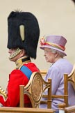 Trooping the Colour 2010: Her Majesty the Queen, Elizabeth II, and The Prince Philip. Duke of Edinburgh, during the &quot;Massed Bands Troop&quot;, sitting in their chairs on the saluting dais..
Horse Guards Parade, Westminster,
London SW1,
Greater London,
United Kingdom,
on 12 June 2010 at 11:26, image #131