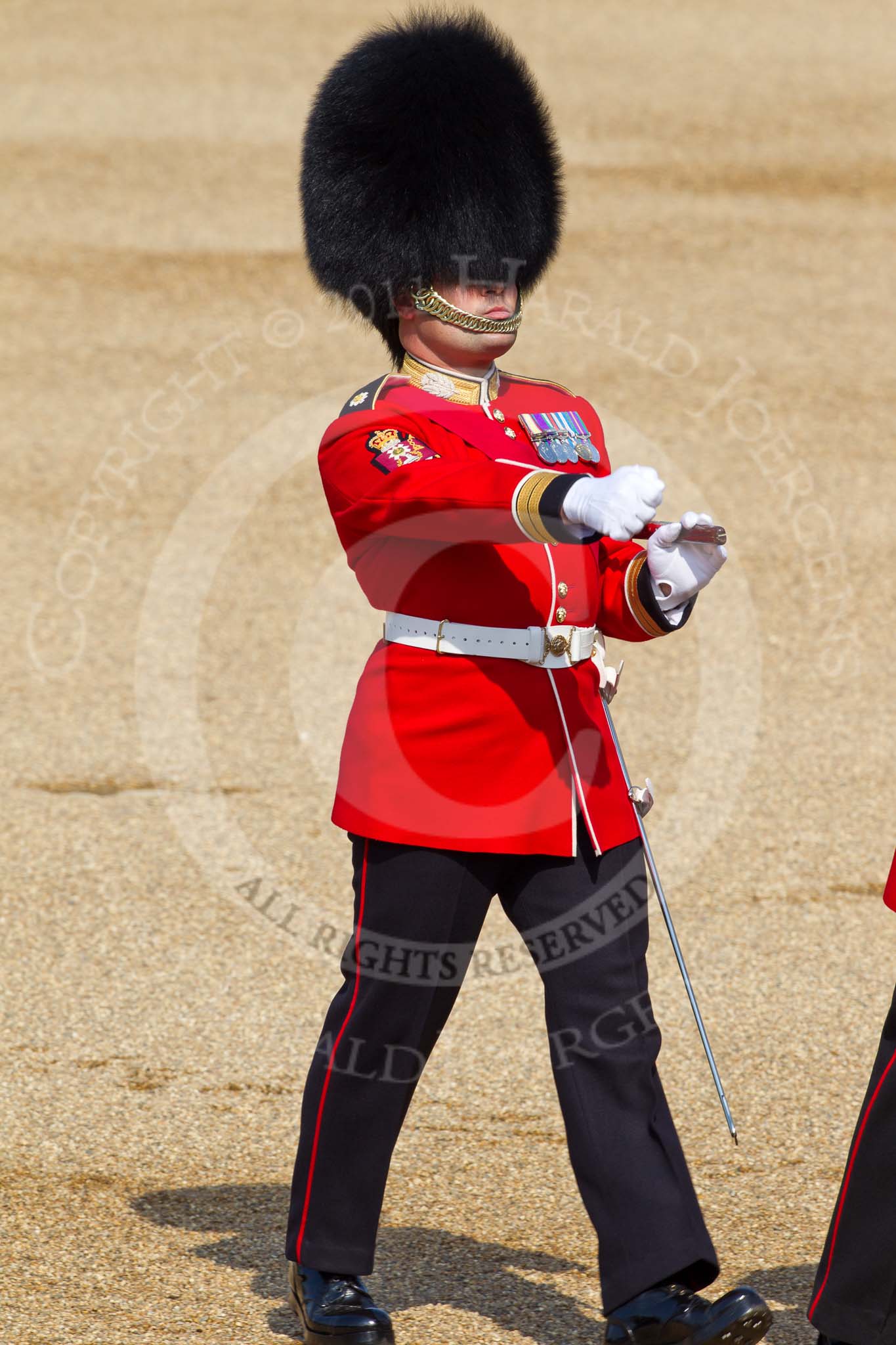 The Colonel's Review 2011: A Company Sergeant Major of the Scots Guards marching across the parade ground..
Horse Guards Parade, Westminster,
London SW1,

United Kingdom,
on 04 June 2011 at 09:40, image #4