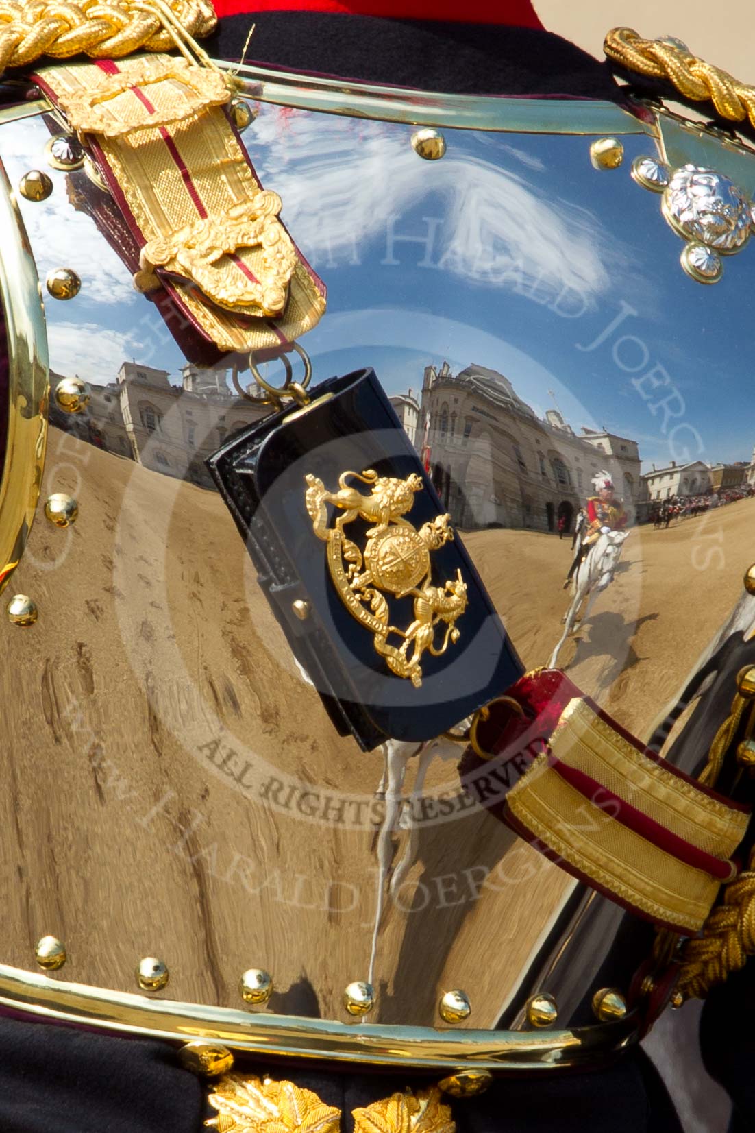 The Colonel's Review 2011: The read shield of Major Twumasi-Ankrah, Blues and Royals, standing in for the Princess Royal, reflecting Horse Guards Building and the following members of the Royal Procession..
Horse Guards Parade, Westminster,
London SW1,

United Kingdom,
on 04 June 2011 at 11:01, image #90