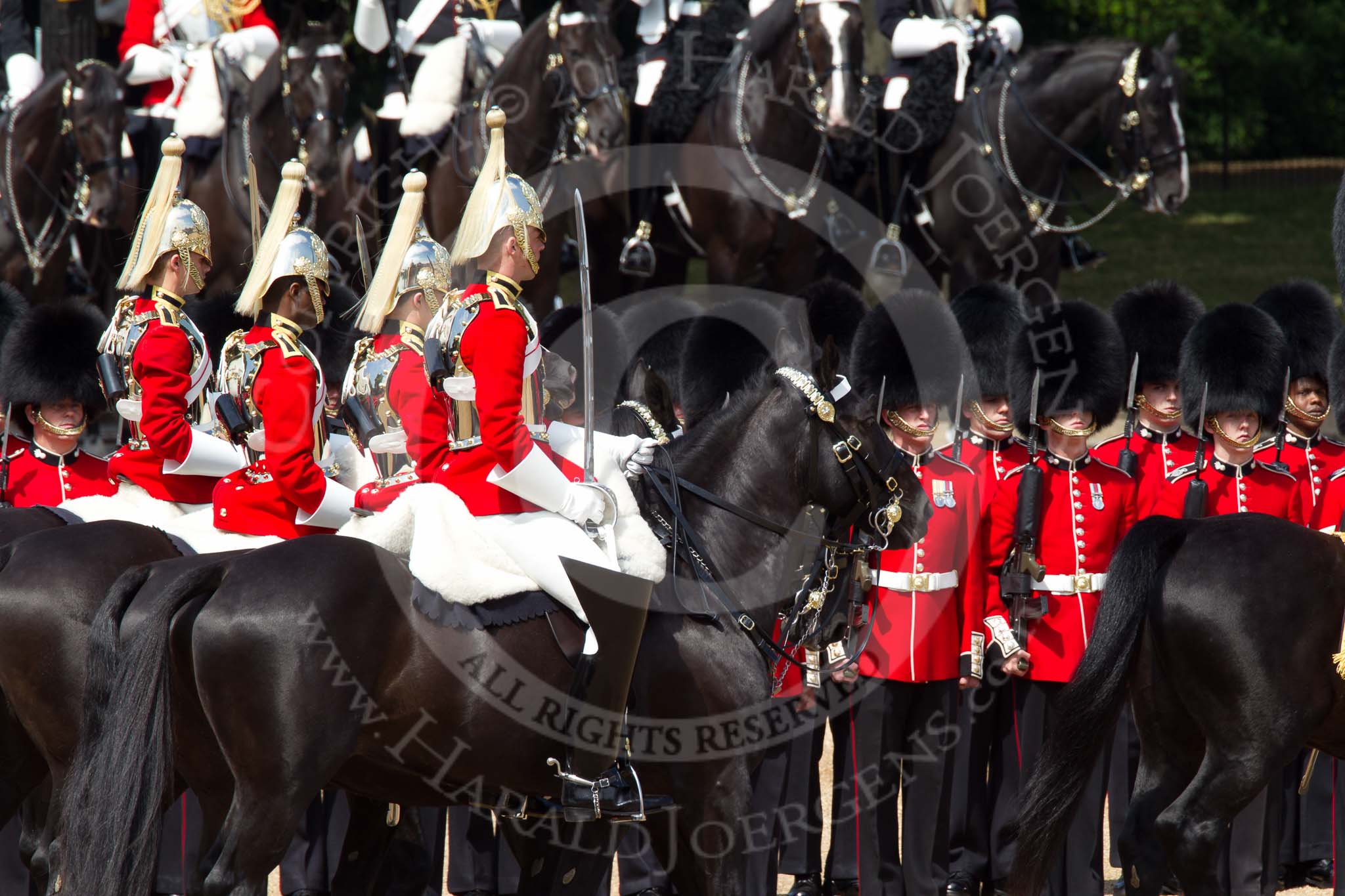 The Colonel's Review 2011: The four Troopers of The Life Guards at the head of the Royal Procession passing No. 4 Guard, Nijmegen Company Grenadier Guards, during the Inspection of the Line..
Horse Guards Parade, Westminster,
London SW1,

United Kingdom,
on 04 June 2011 at 11:02, image #92