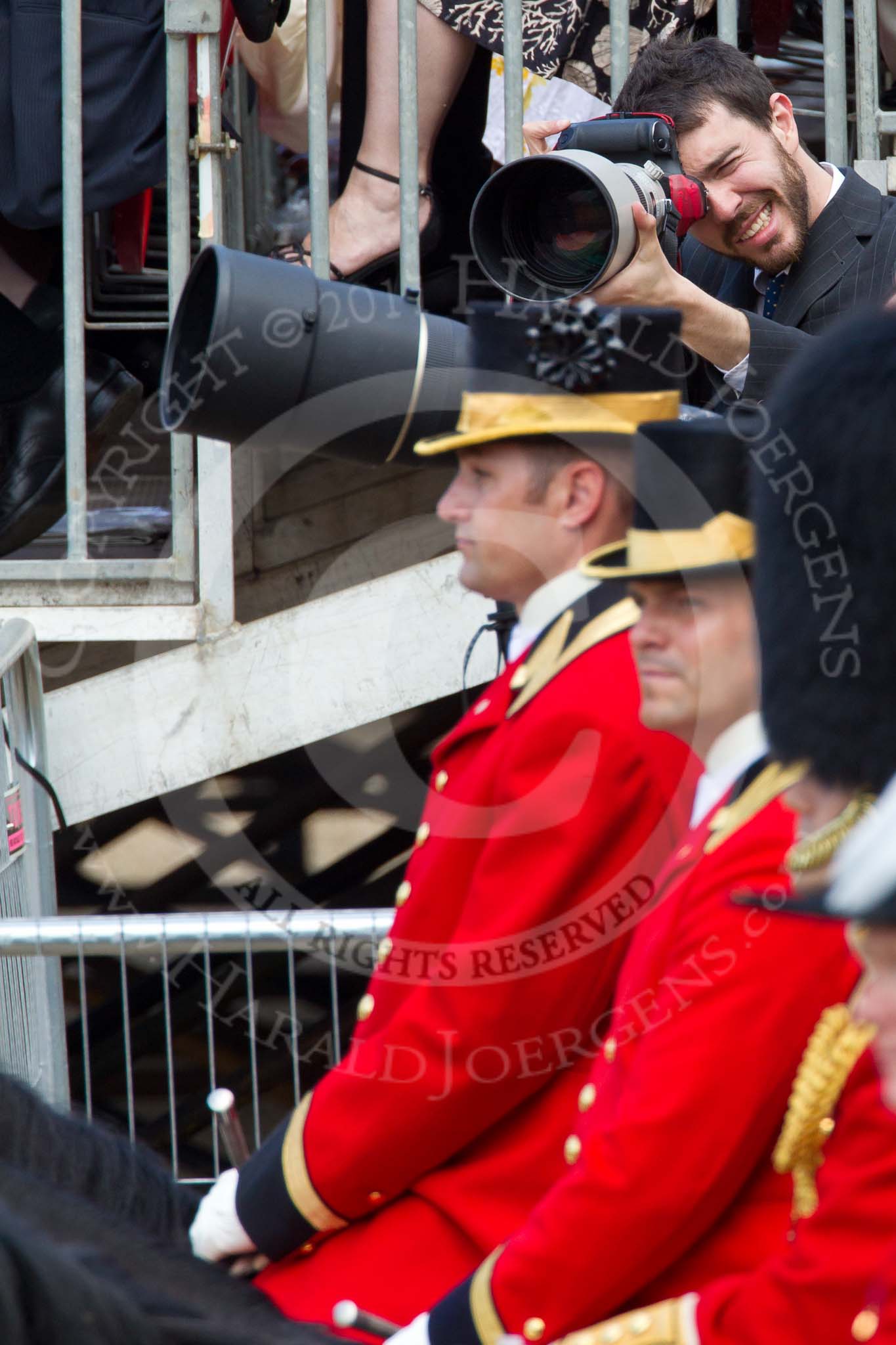 The Colonel's Review 2011: The two Grooms from The Royal Household that are part of the Royal Procession, with a photographer's stand and a grand stand behind..
Horse Guards Parade, Westminster,
London SW1,

United Kingdom,
on 04 June 2011 at 11:09, image #111