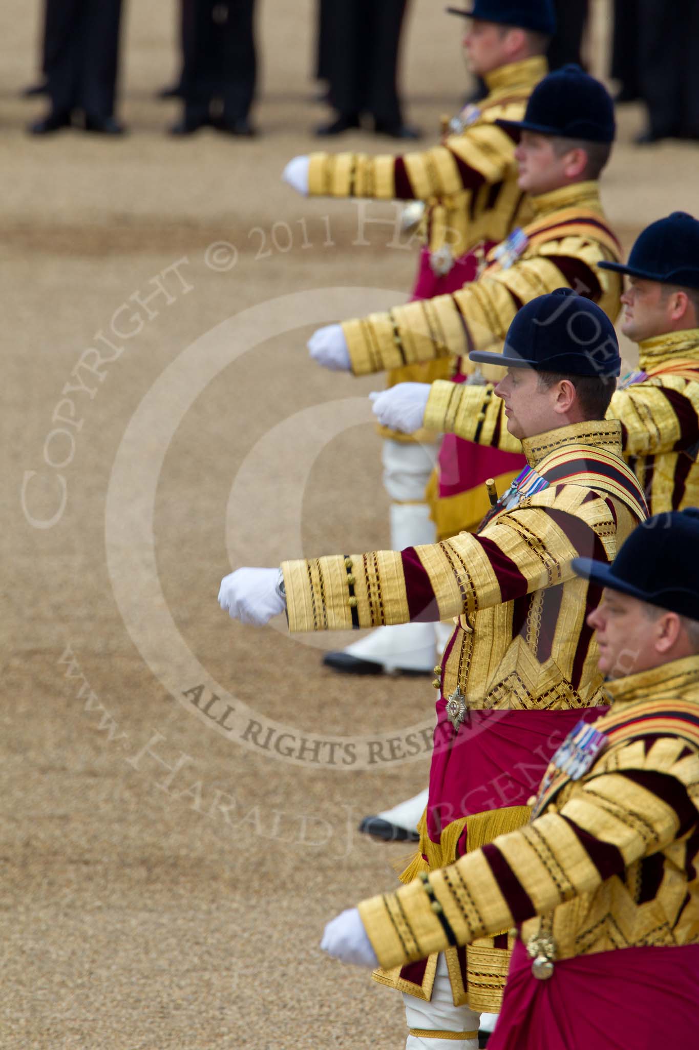 The Colonel's Review 2011: Five drum majors marching in front of the Massed Bands. From front to back, Stephen Staite, Grenadier Guards, Tony Taylor, No. 7 Company Coldstream Guards, Ben Roberts, Coldstream Guards, Alan Harvey, Irish Guards, and Scott Fitzgerald, Coldstream Guards..
Horse Guards Parade, Westminster,
London SW1,

United Kingdom,
on 04 June 2011 at 11:12, image #117