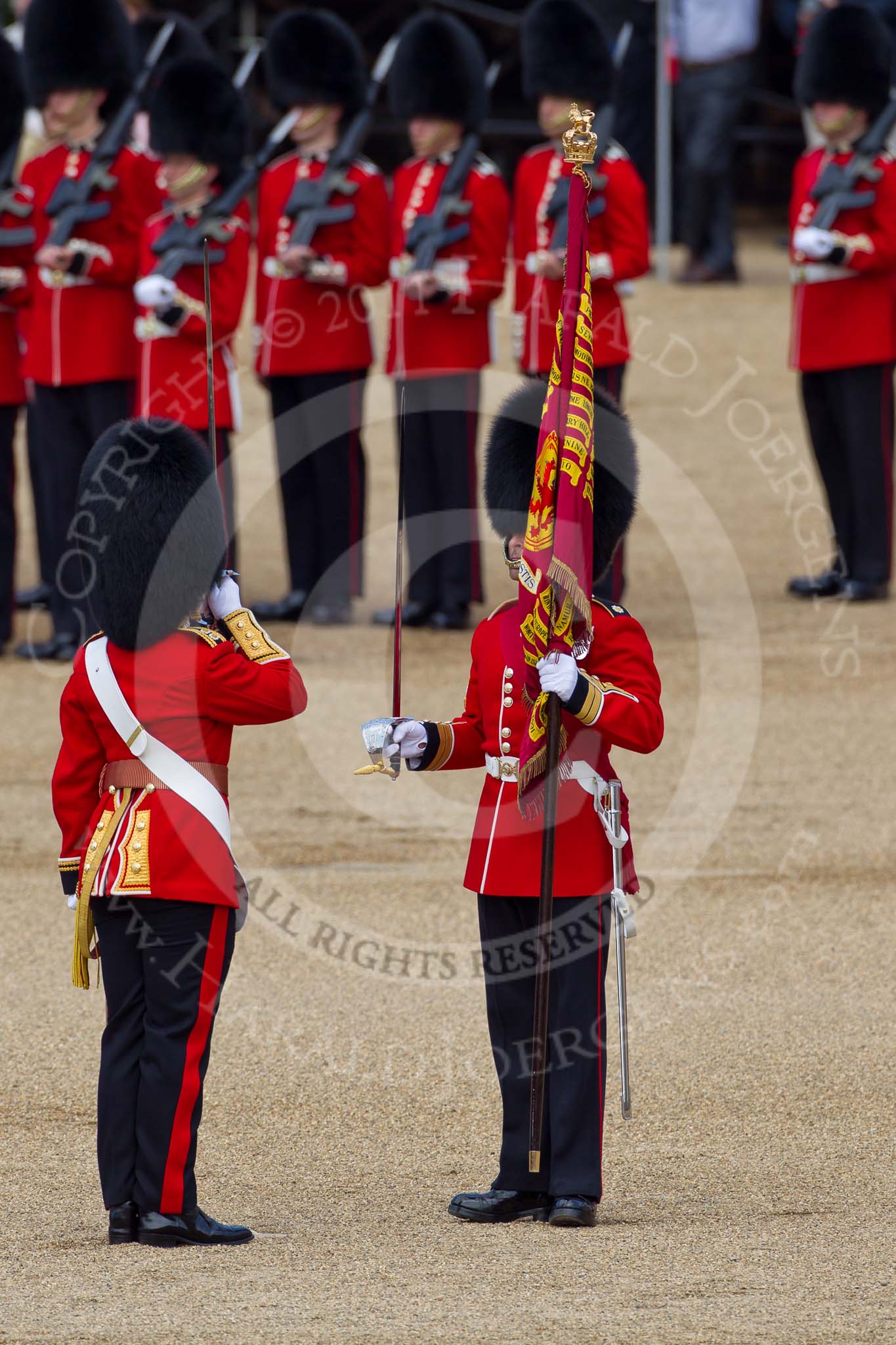 The Colonel's Review 2011: The Regimental Sergeant Major, A I Mackenzie, is about to give the Colour to the Ensign, Lieutenant Tom Ogilvy, on the left..
Horse Guards Parade, Westminster,
London SW1,

United Kingdom,
on 04 June 2011 at 11:19, image #132
