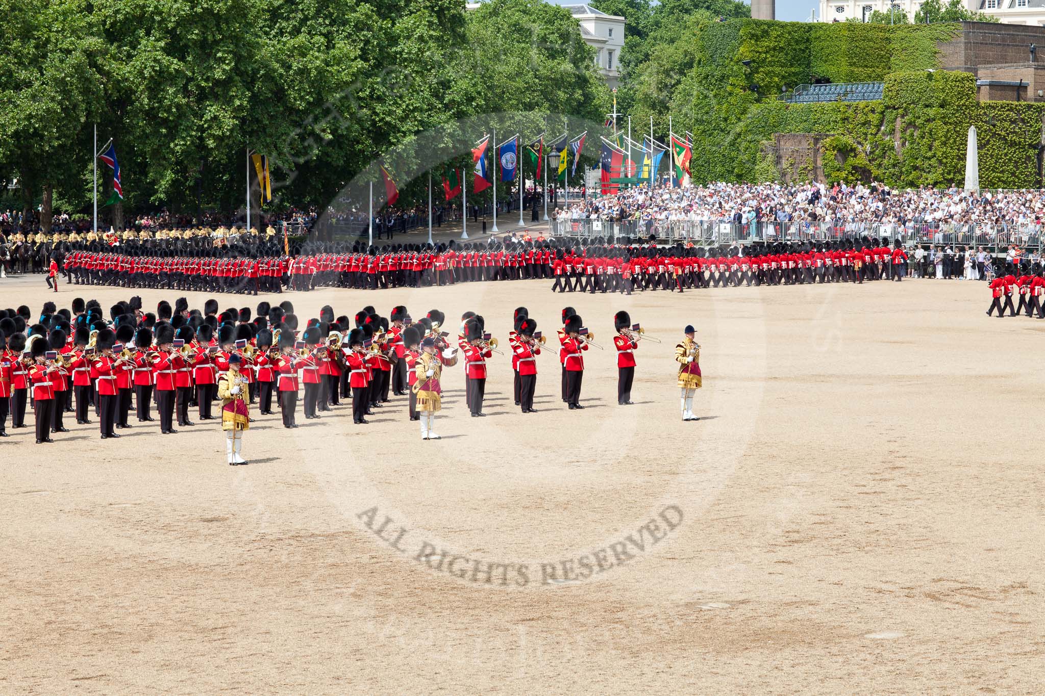 The Colonel's Review 2011: The guards are about to complete the March Past in slow time. On the left, standing in the Centre of Horse Guards Parade, the Massed Bands..
Horse Guards Parade, Westminster,
London SW1,

United Kingdom,
on 04 June 2011 at 11:47, image #219