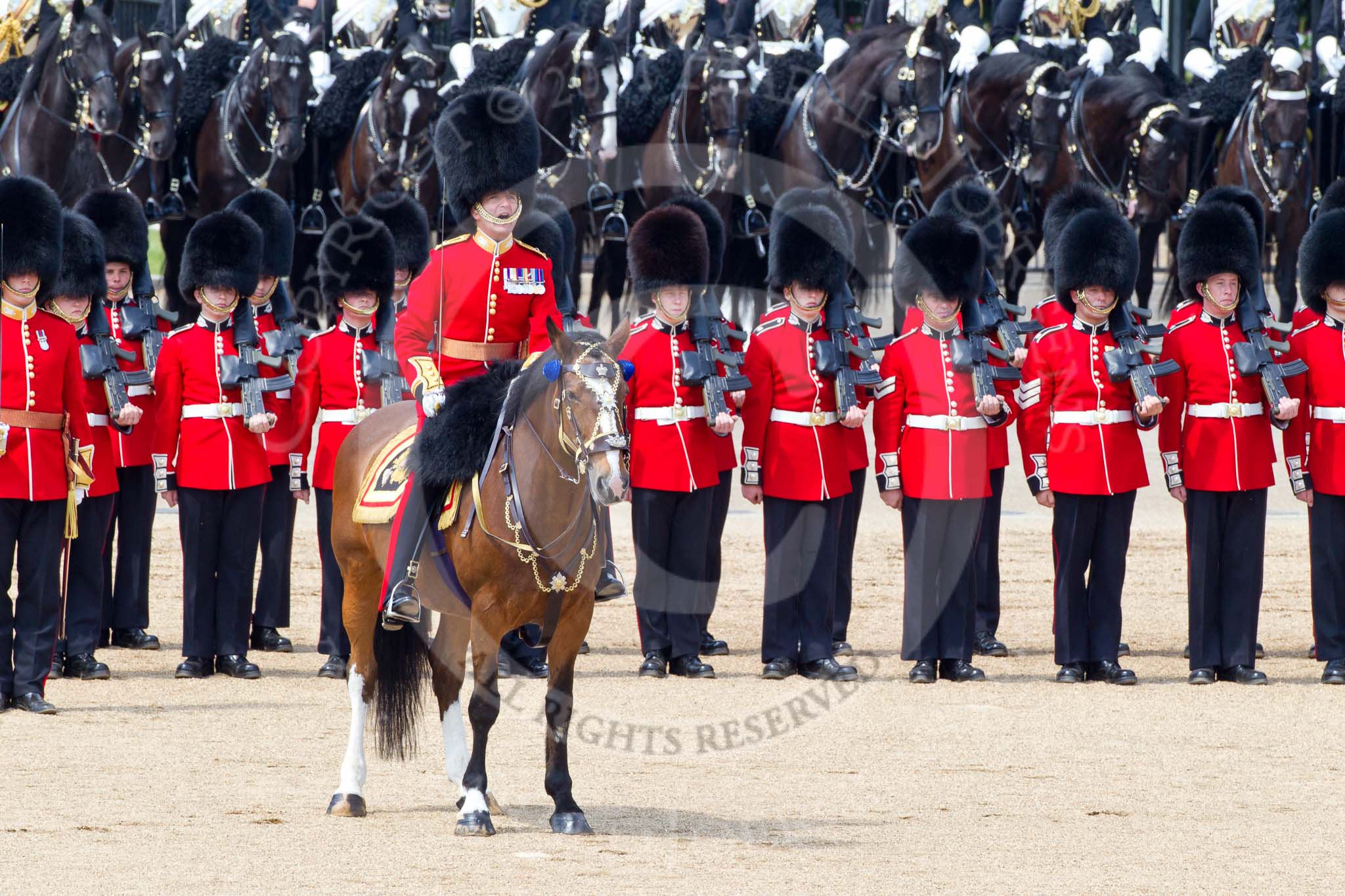 The Colonel's Review 2011: The Field Officer, Lieutenant Colonel L P M Jopp, riding 'Burniston', here in front of No. 2 Guard, B Company Scots Guards, commanding the last phase of the rehearsal..
Horse Guards Parade, Westminster,
London SW1,

United Kingdom,
on 04 June 2011 at 12:00, image #269
