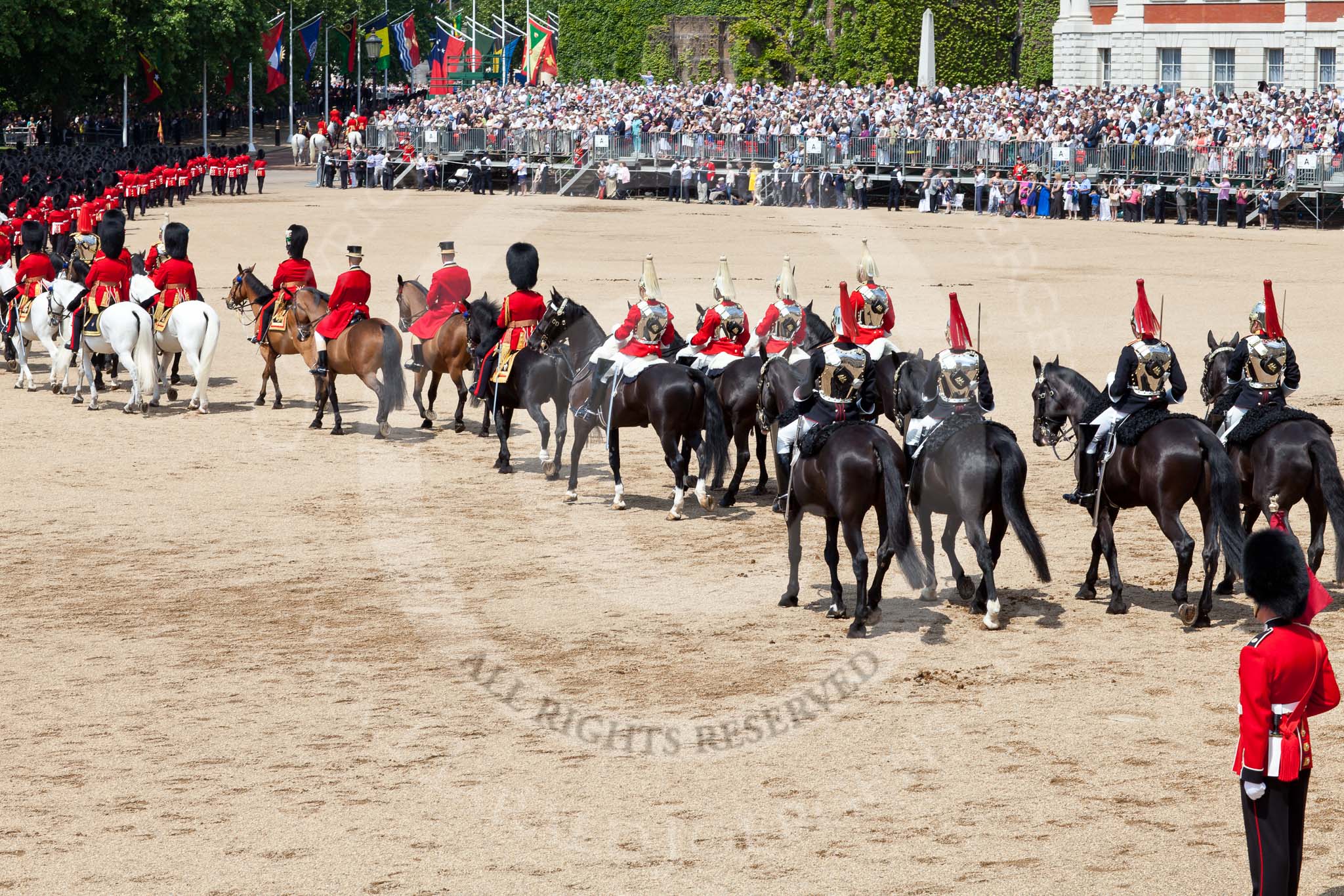 The Colonel's Review 2011: Marching Off - the guards leaving Horse Guards Parade, marching towards The Mall, followed by the Royal Procession, with the four Troopers of The Life Guards and the four Troopers of the Blues and Royals at the end..
Horse Guards Parade, Westminster,
London SW1,

United Kingdom,
on 04 June 2011 at 12:09, image #300