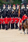 The Colonel's Review 2011: The Esnsign, Tom Ogilvy, is marching in front of the line of guards (here No. 3 Guard, F Company Scots Guards, whilst the other guardsmen of the Escort are marching between the two lines of guards. In the background the Blues and Royals, in front the Field Officer, L P M Jopp..
Horse Guards Parade, Westminster,
London SW1,

United Kingdom,
on 04 June 2011 at 11:25, image #146