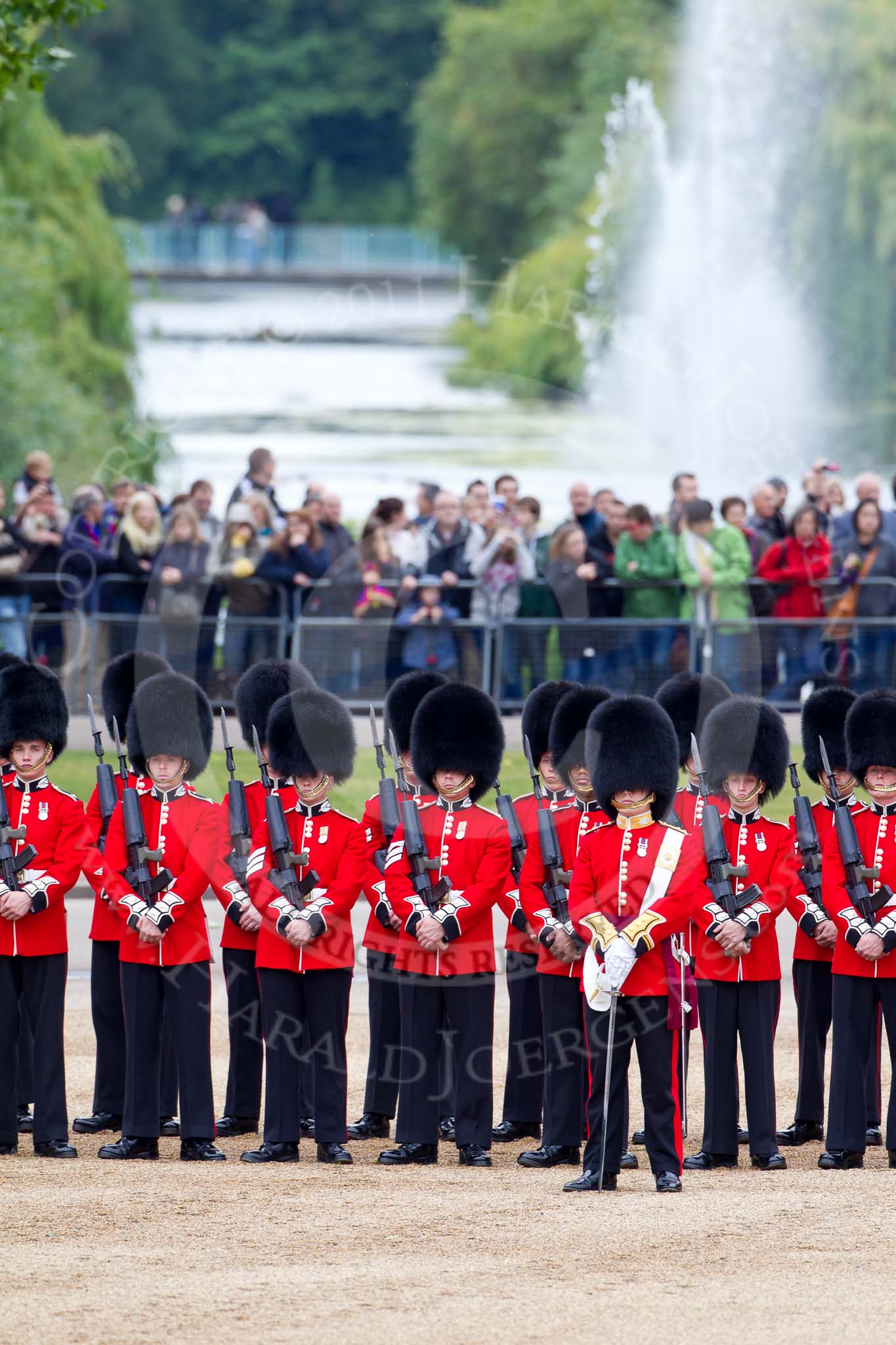 The Major General's Review 2011: No. 1 Guard, 1st Battalion Scots Guards, the Escort for the Colour. In front, with the white colour belt, the Ensign, Lieutenant Tom Ogilvy. In the backgroud spectators watching from St. James's Park..
Horse Guards Parade, Westminster,
London SW1,
Greater London,
United Kingdom,
on 28 May 2011 at 10:46, image #80