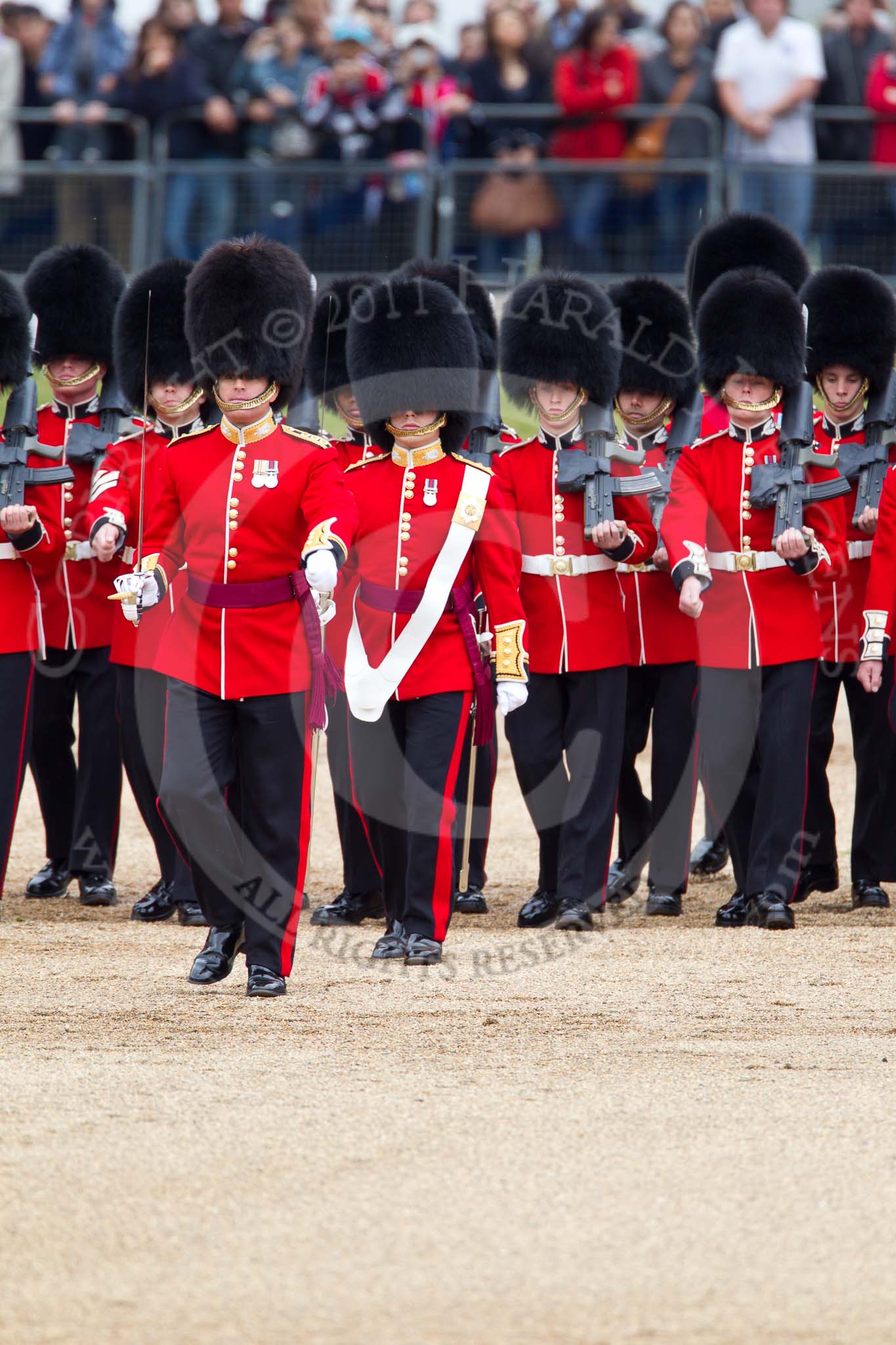 The Major General's Review 2011: No. 1 Guard, 1st Battalion Scots Guards, the Escort for the Colour, moving forward to collect the Colour. In front the Subaltern to the Escort,  Captain Krause-Harder-Colthorpe, behind, with the white colour belt, the Ensign, Lieutenant Tom Ogilvy..
Horse Guards Parade, Westminster,
London SW1,
Greater London,
United Kingdom,
on 28 May 2011 at 11:16, image #152