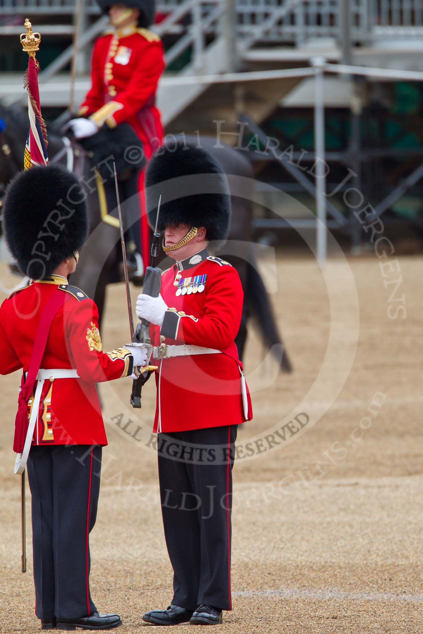 The Major General's Review 2011: The Colour hass been handed over to the Regimental Sergeant Major, WO1 A I Mackenzie, on the left, who will give it to the Ensign. With the rifle, Colour Sergeant Chris Millin..
Horse Guards Parade, Westminster,
London SW1,
Greater London,
United Kingdom,
on 28 May 2011 at 11:20, image #157