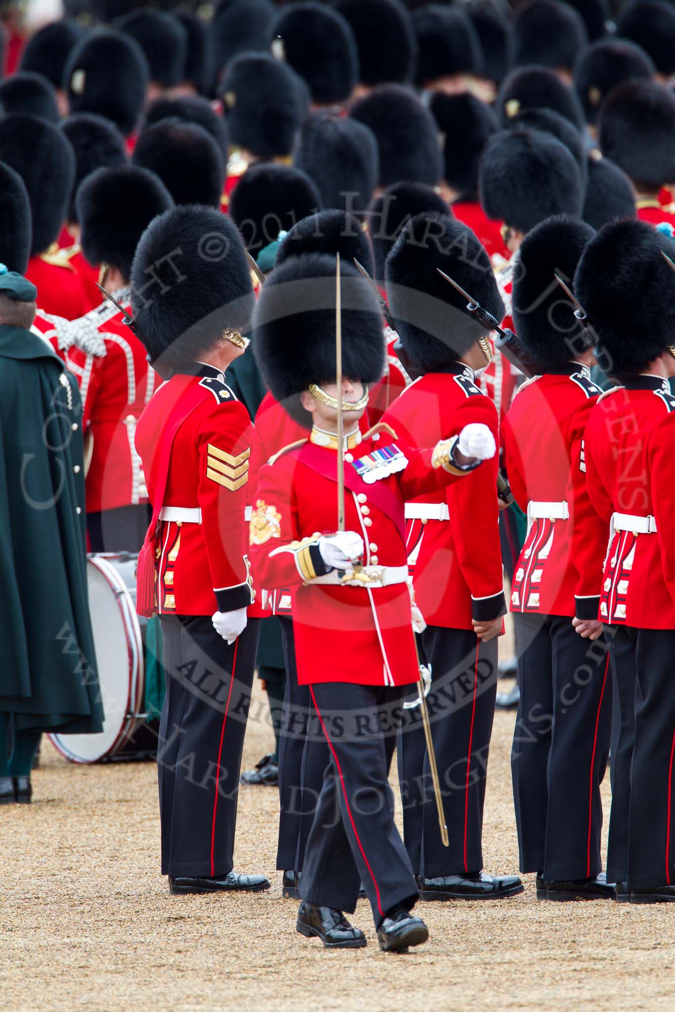 The Major General's Review 2011: The Regimental Sergeant Major, WO1 A I Mackenzie, Scots Guards, marching behind the Escort to the Colour. In front of them the Massed Bands..
Horse Guards Parade, Westminster,
London SW1,
Greater London,
United Kingdom,
on 28 May 2011 at 11:21, image #166