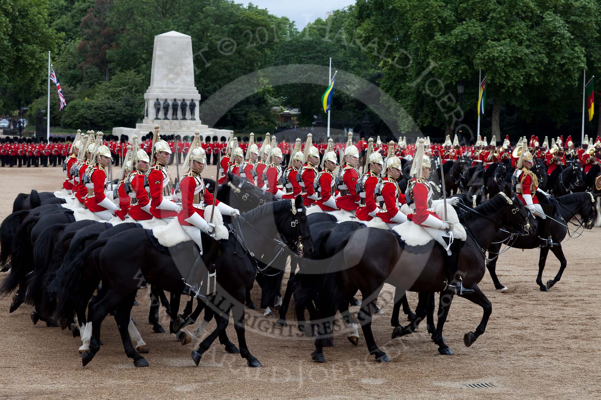 The Major General's Review 2011: The Life Guards during the Ride Past. In the background the Guards Memorial behind the line of guardsmen from No. 1 to No. 5 Guard..
Horse Guards Parade, Westminster,
London SW1,
Greater London,
United Kingdom,
on 28 May 2011 at 11:55, image #244